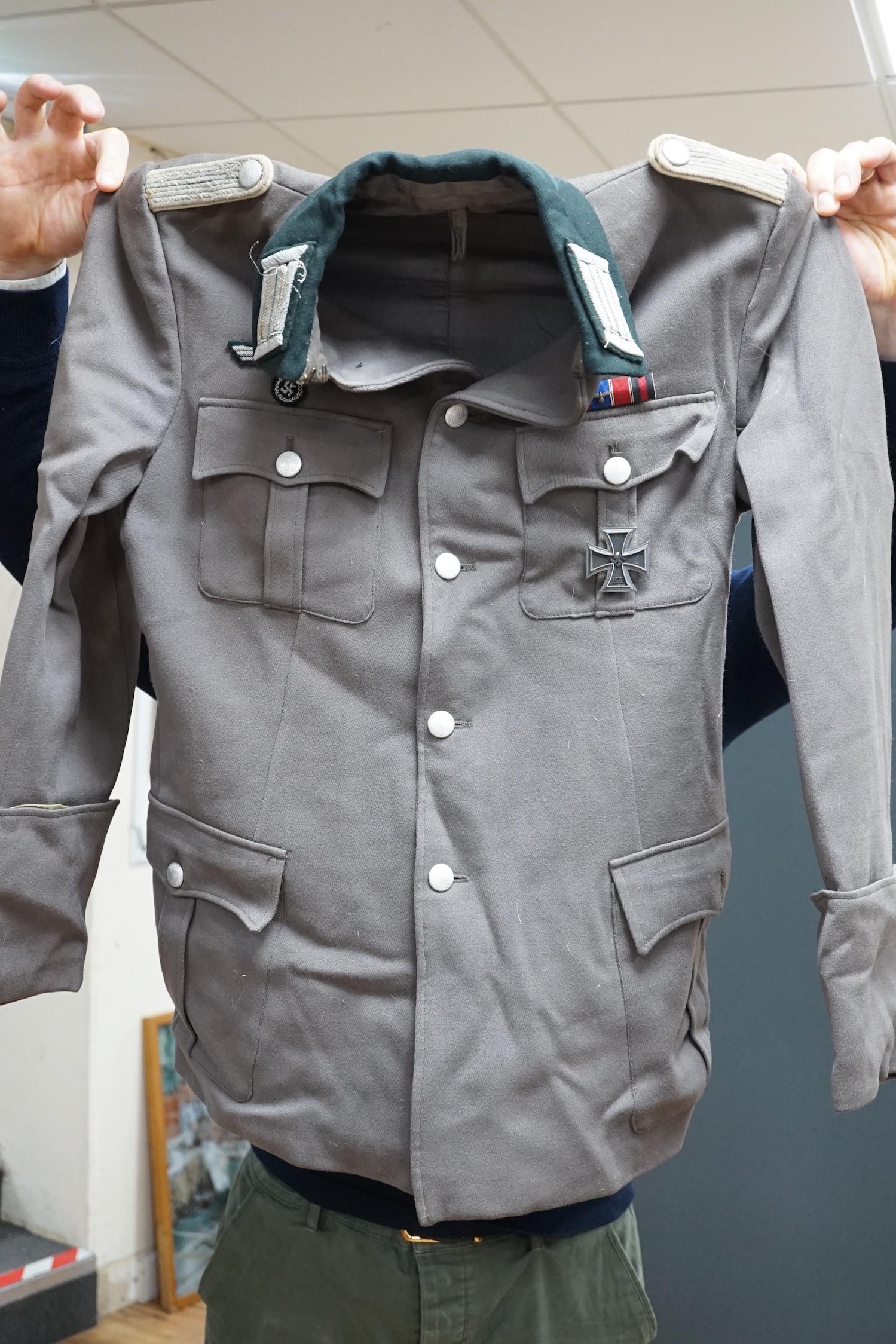 A collection of miltary / air uniforms including German
